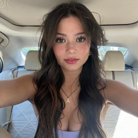 Ava  Monpere taking a selfie in her car.
